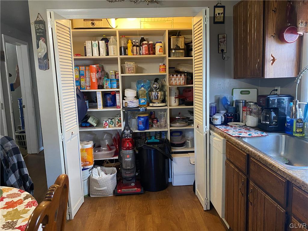 118 East Ruddle Street Coaldale, PA 18218 - Photo 19 of 42 a kitchen with a refrigerator and a window