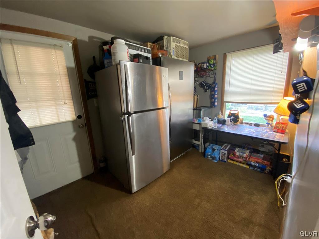 118 East Ruddle Street Coaldale, PA 18218 - Photo 23 of 42 a kitchen with refrigerator and window