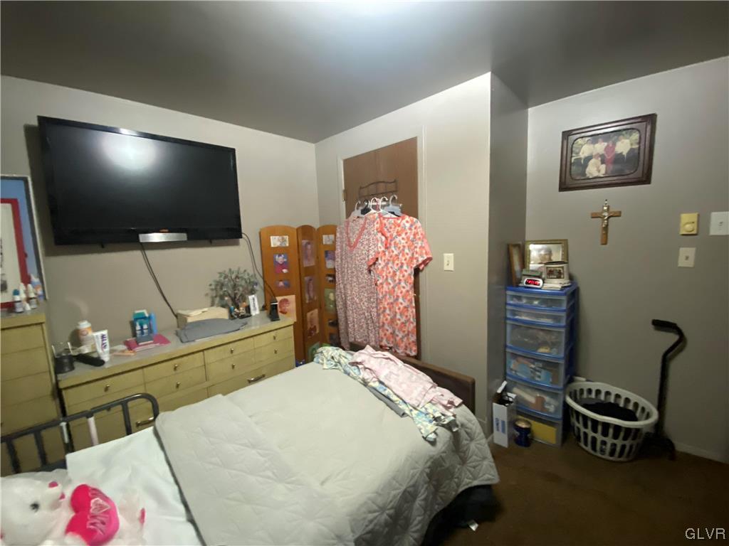118 East Ruddle Street Coaldale, PA 18218 - Photo 28 of 42 a bedroom with a bed and furniture