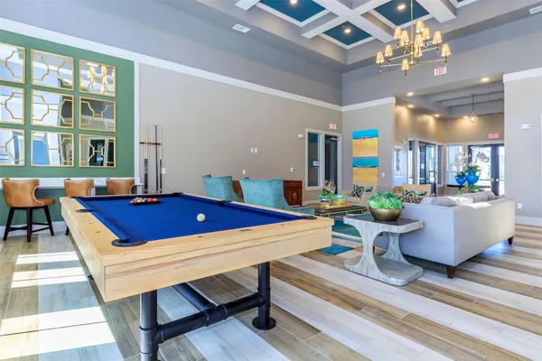 a view of a house with a yard and porch