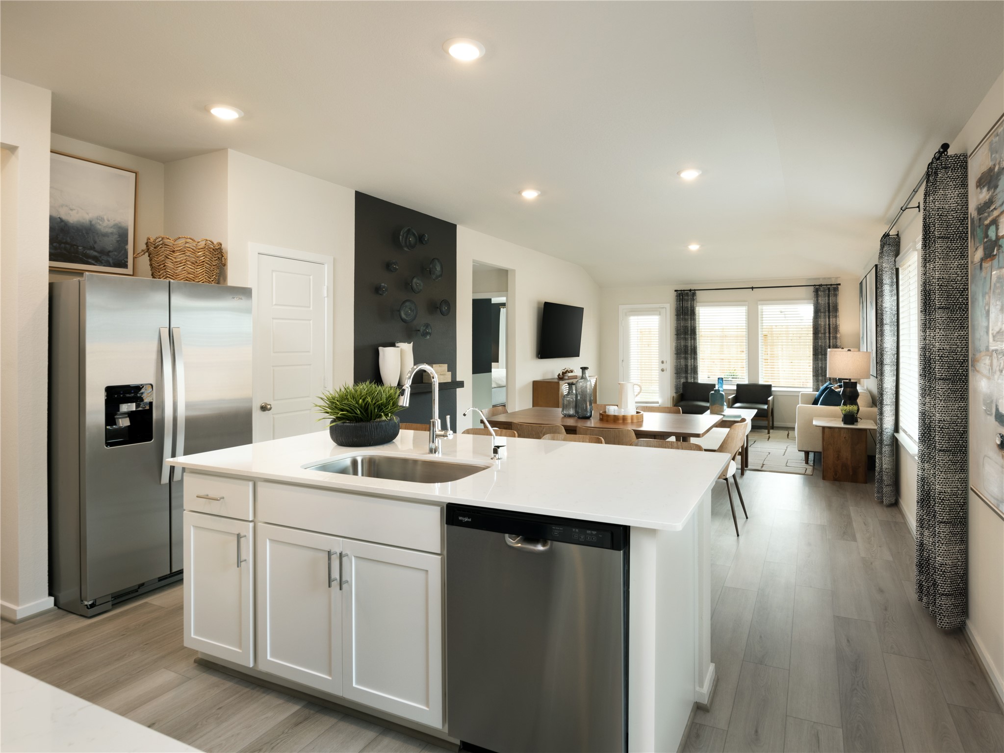 14170 Granger Pointe Lane Conroe, TX 77302 - Photo 4 of 7 Photo is not of the actual home, but is an inspirational photo of builder’s model home and may depict options, furnishings, and/or decorator features that are not included