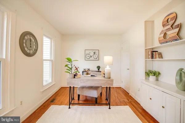 a kitchen with lots of counter top space sink and window