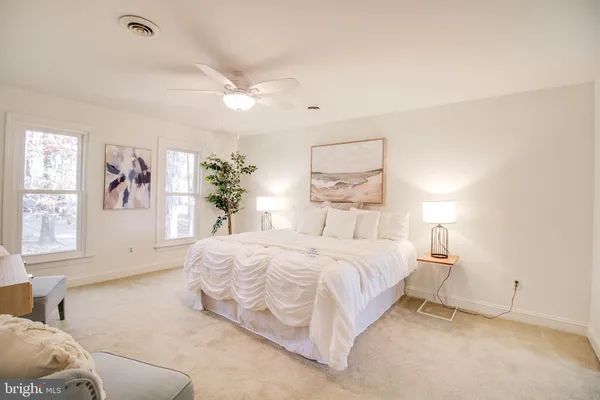 a bathroom with a sink a vanity and a mirror