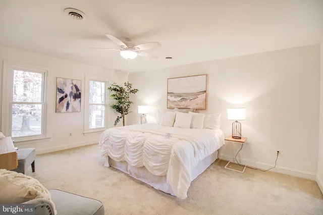 a bathroom with a sink a vanity and a mirror