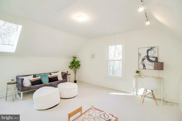 a view of a swimming pool with a yard