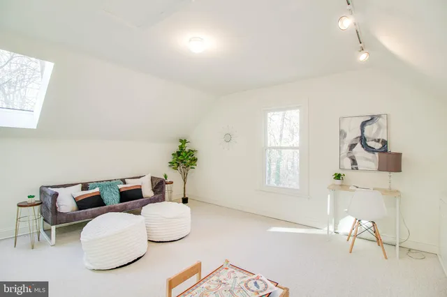 a view of a swimming pool with a yard