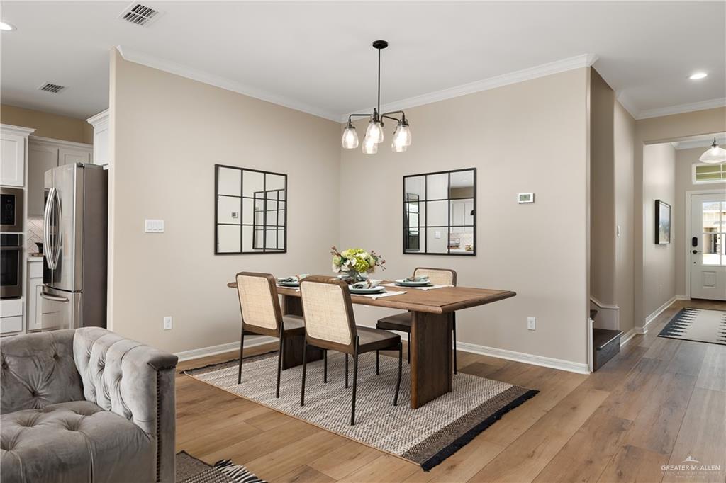 6343 Cascada Bnd Road McAllen, TX 78504 - Photo 17 of 35 a view of a livingroom with furniture and a dining table