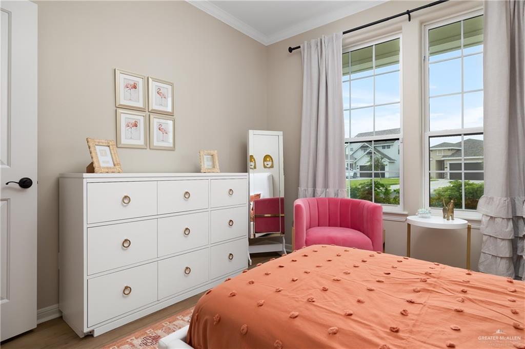 6343 Cascada Bnd Road McAllen, TX 78504 - Photo 26 of 35 a bedroom with a bed and a window