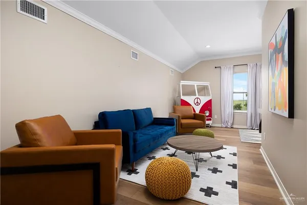 a living room with furniture and a couch