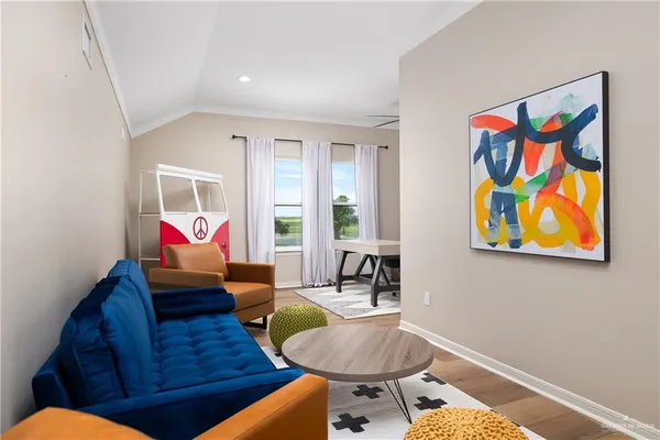 a living room with furniture and window