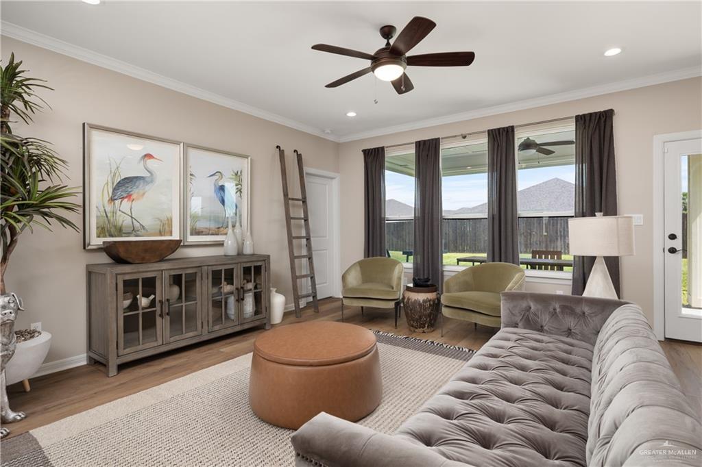 6343 Cascada Bnd Road McAllen, TX 78504 - Photo 34 of 35 a living room with furniture and a large window