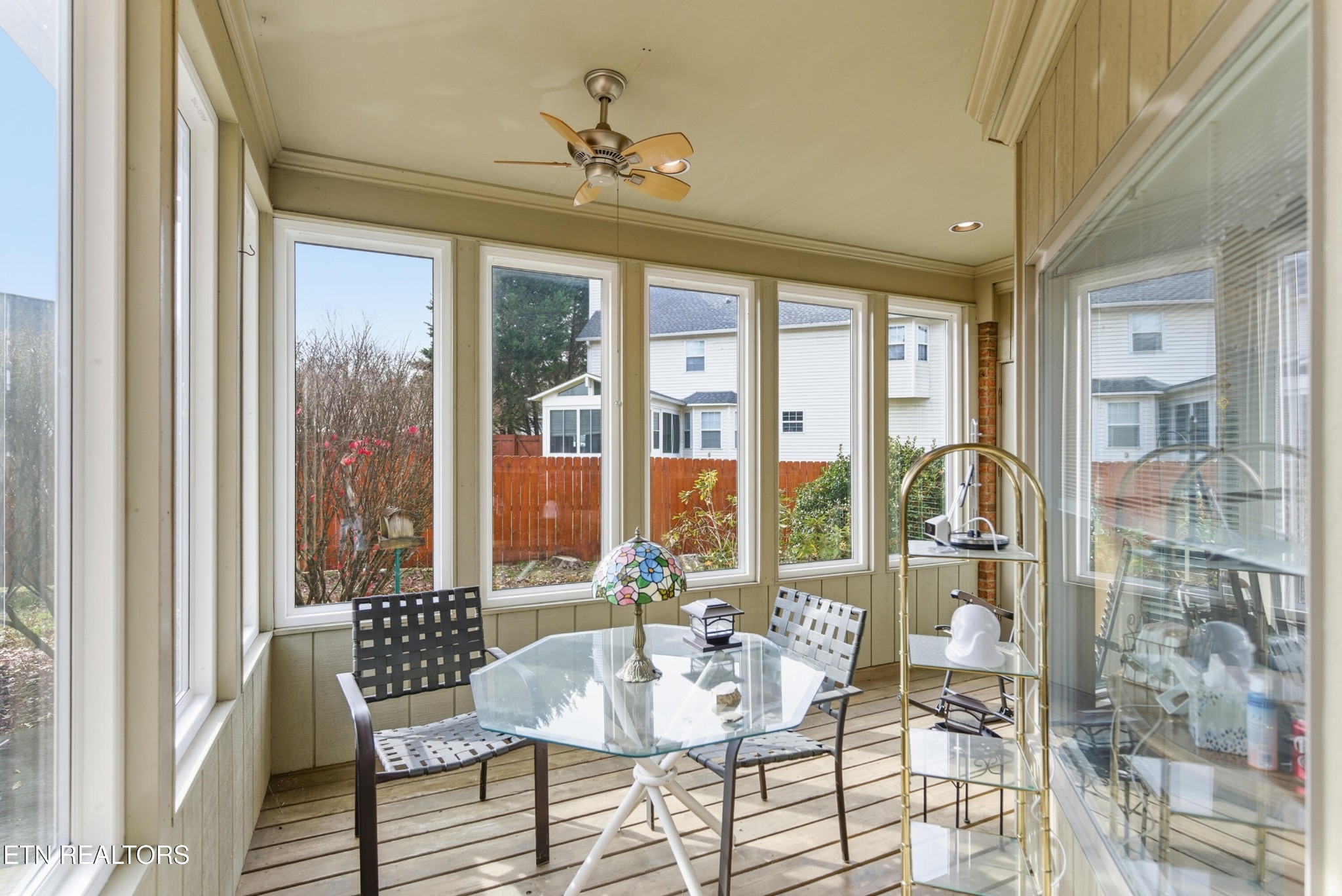 92 North Claymore Lane Oak Ridge, TN 37830 - Photo 28 of 32 a living room with furniture and a floor to ceiling window