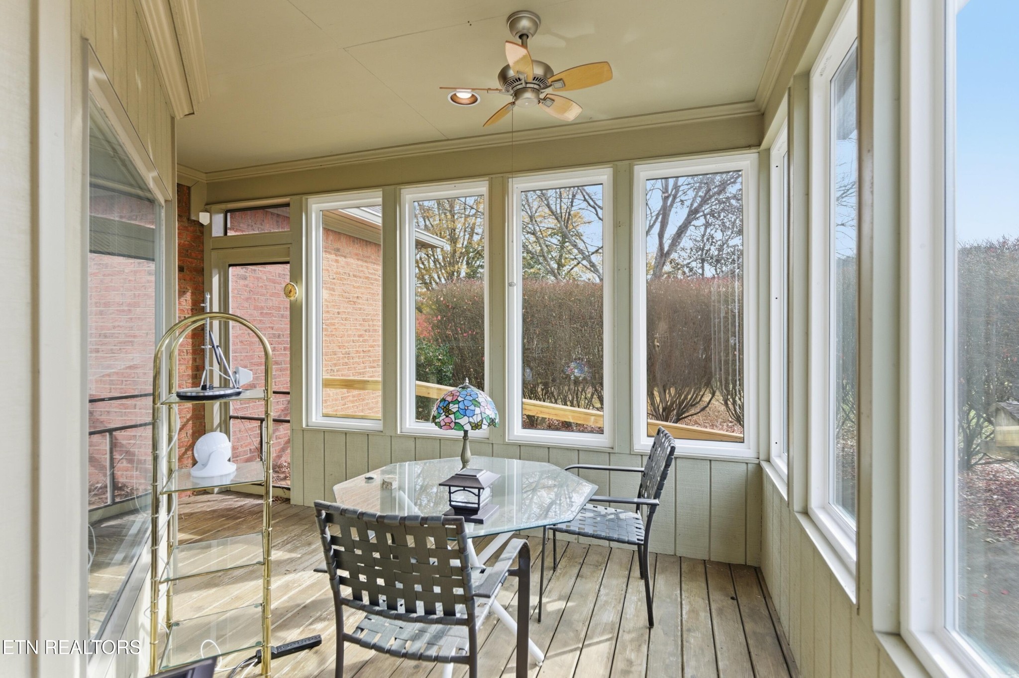 92 North Claymore Lane Oak Ridge, TN 37830 - Photo 29 of 32 a dining room with furniture a chandelier and wooden floor