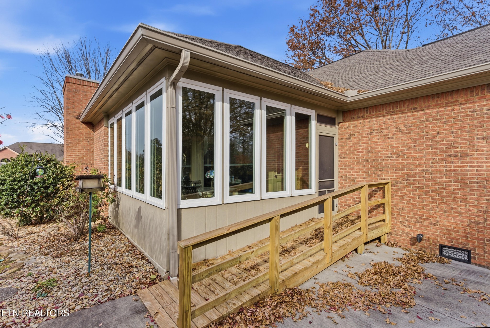 92 North Claymore Lane Oak Ridge, TN 37830 - Photo 30 of 32 a view of wooden house with a large window