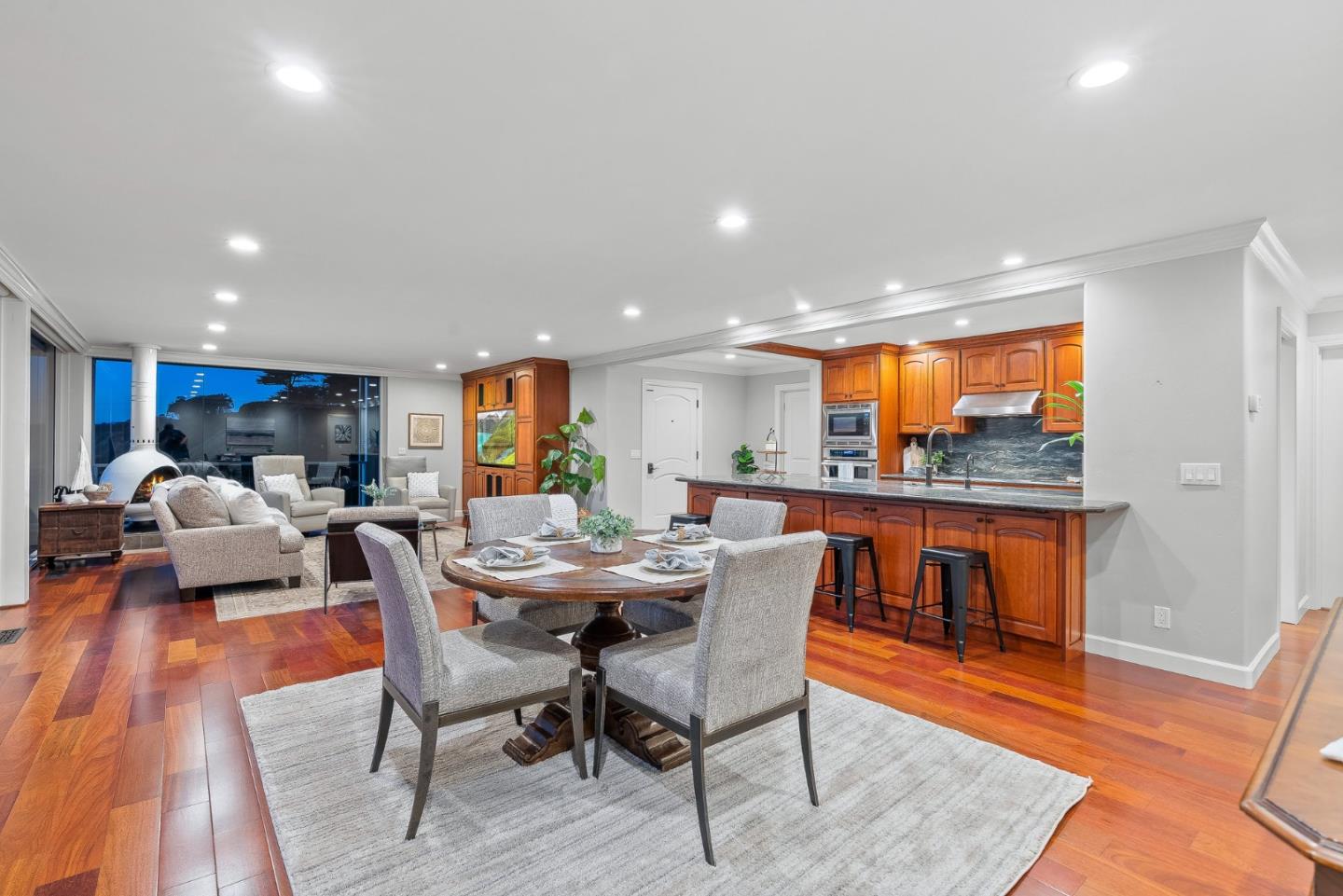 300 Oceanview Drive, Unit 401 La Selva Beach, CA 95076 - Photo 27 of 44 a dining room with furniture a window and wooden floor