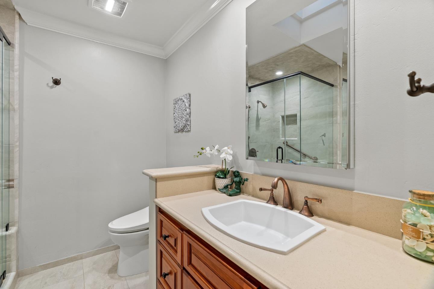 300 Oceanview Drive, Unit 401 La Selva Beach, CA 95076 - Photo 31 of 44 a bathroom with a sink toilet and shower