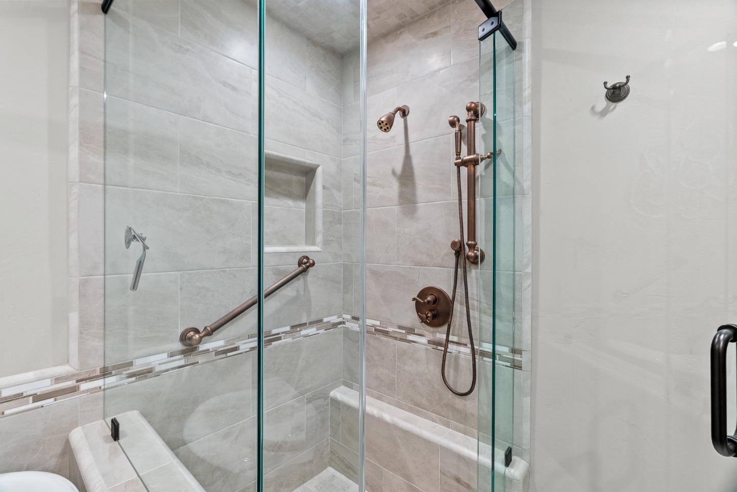 300 Oceanview Drive, Unit 401 La Selva Beach, CA 95076 - Photo 32 of 44 a bathroom with a granite countertop shower