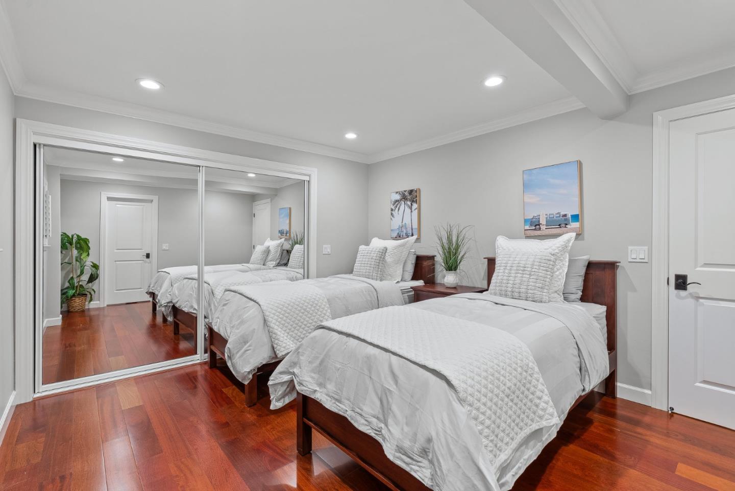 300 Oceanview Drive, Unit 401 La Selva Beach, CA 95076 - Photo 38 of 44 a bedroom with two beds and a potted plant