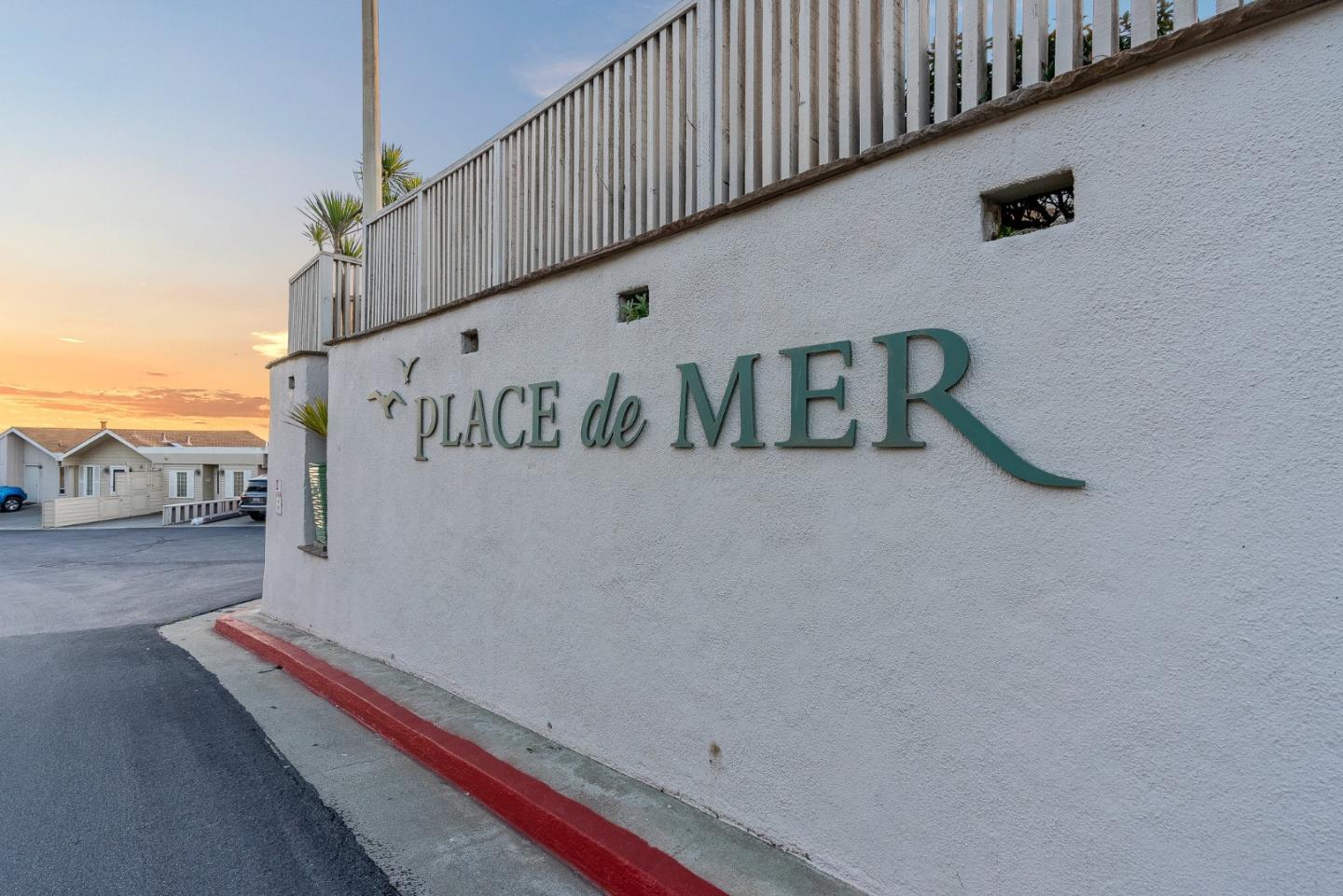 300 Oceanview Drive, Unit 401 La Selva Beach, CA 95076 - Photo 8 of 44 a wooden bench sitting in front of a building