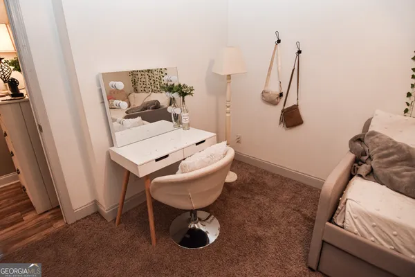 a view of a room with furniture