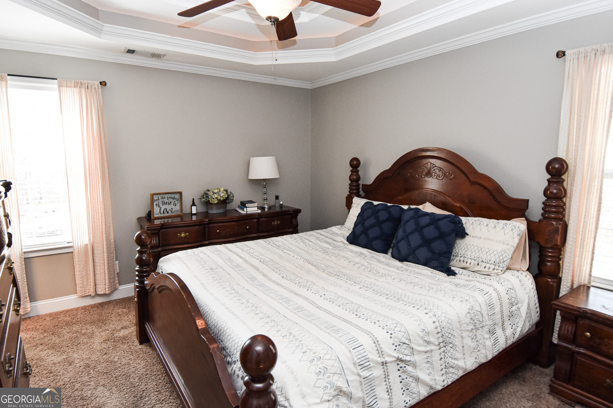 1515 Smyrna Church Road Molena, GA 30258 - Photo 27 of 34 a bed room with a bed and a chandelier
