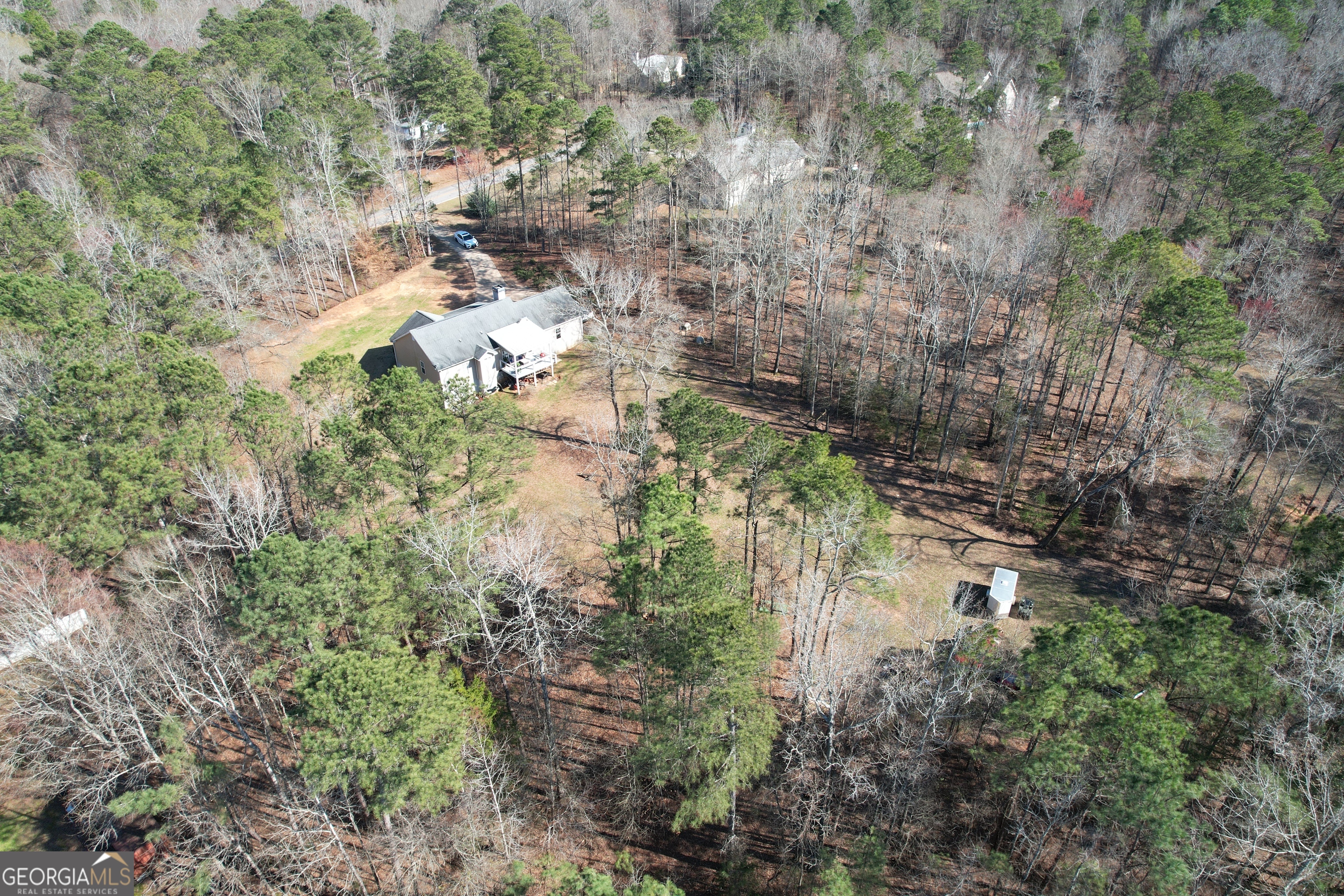 1515 Smyrna Church Road Molena, GA 30258 - Photo 33 of 34 a view of a yard with plants and trees