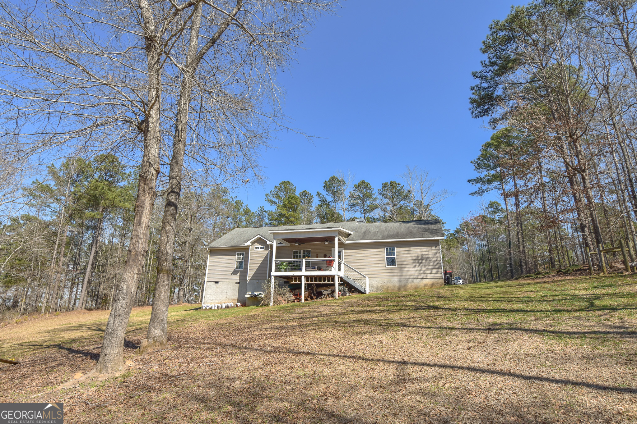 1515 Smyrna Church Road Molena, GA 30258 - Photo 5 of 34 a front view of a house with a garden