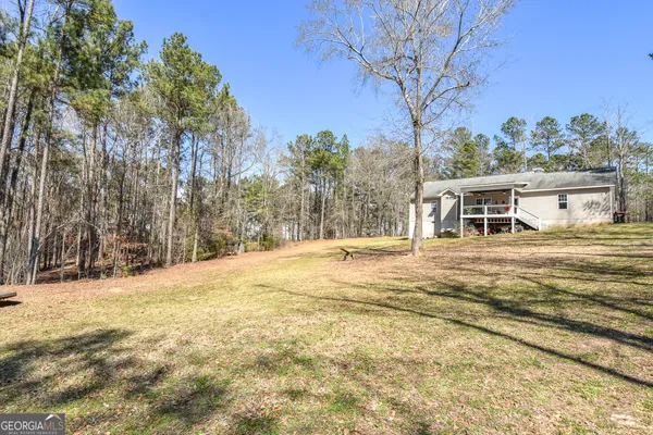 a house with trees in front of it