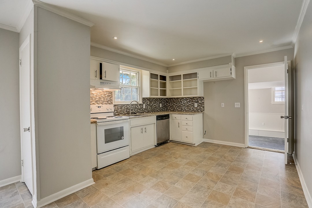 476 Rural Hill Road Nashville, TN 37217 - Photo 8 of 53 a large white kitchen with a stove a sink a refrigerator and cabinets