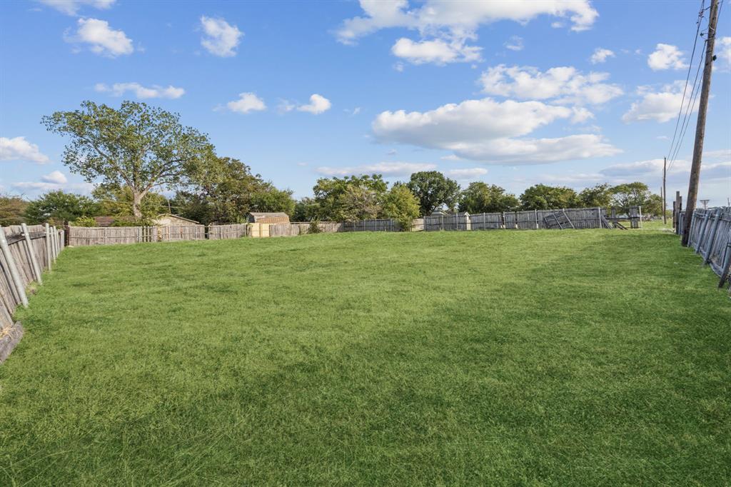 2726 Jeff Street Dallas, TX 75212 - Photo 2 of 7 a view of grassy field with trees
