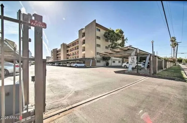 a view of a building with a street