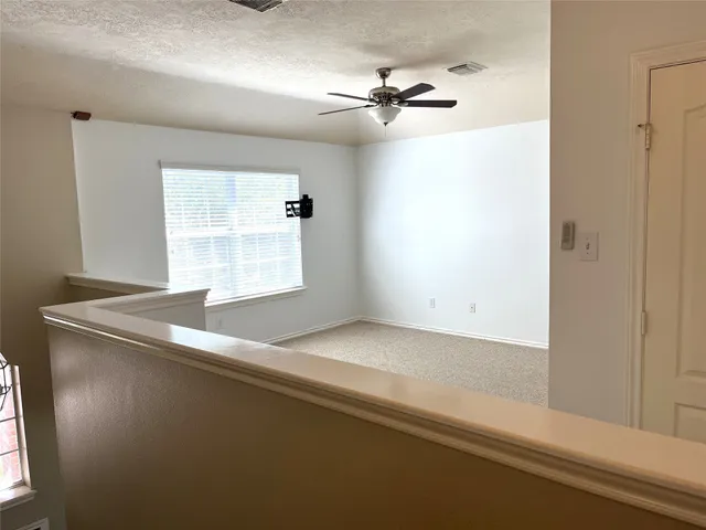 a picture of a bathroom with a shower