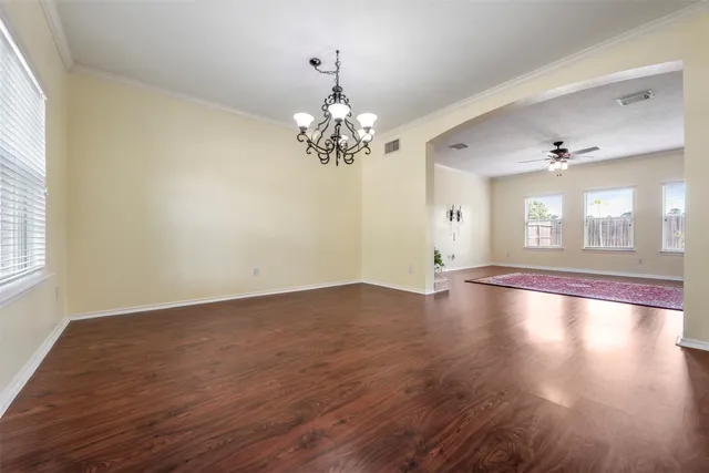 a kitchen with a sink cabinets and window