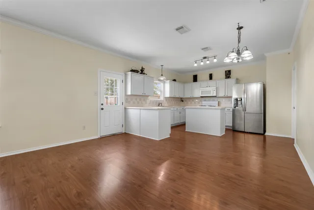a bathroom with a toilet a sink and a mirror
