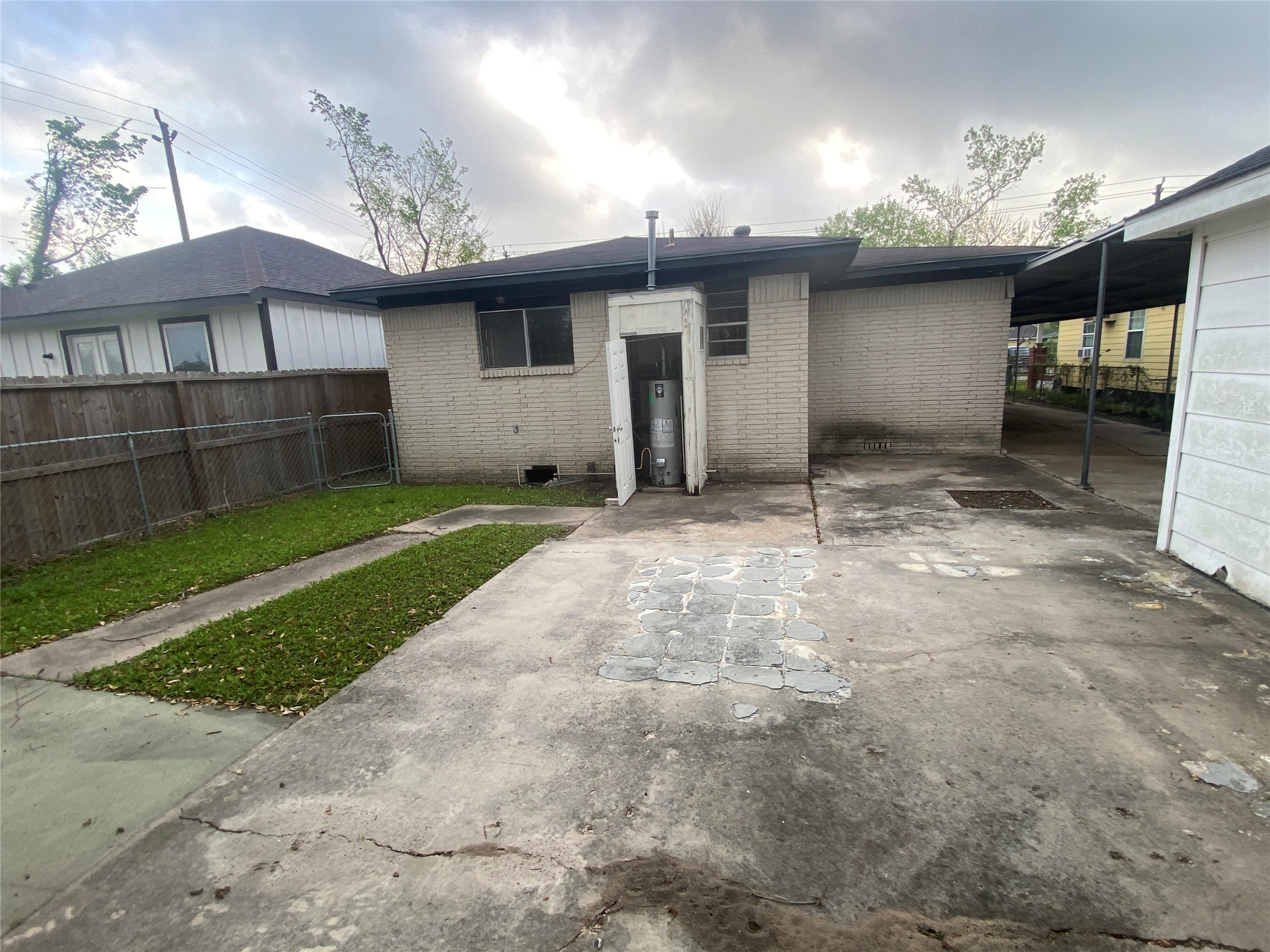 2627 Stevens Street Houston, TX 77026 - Photo 15 of 18 a view of a house with a backyard