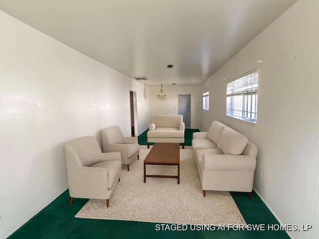 2627 Stevens Street Houston, TX 77026 - Photo 5 of 18 a living room with furniture and a rug