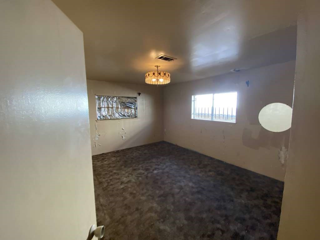 2627 Stevens Street Houston, TX 77026 - Photo 7 of 18 a view of an empty room and window