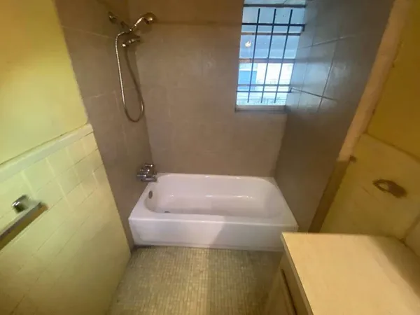 a bathroom with a tub