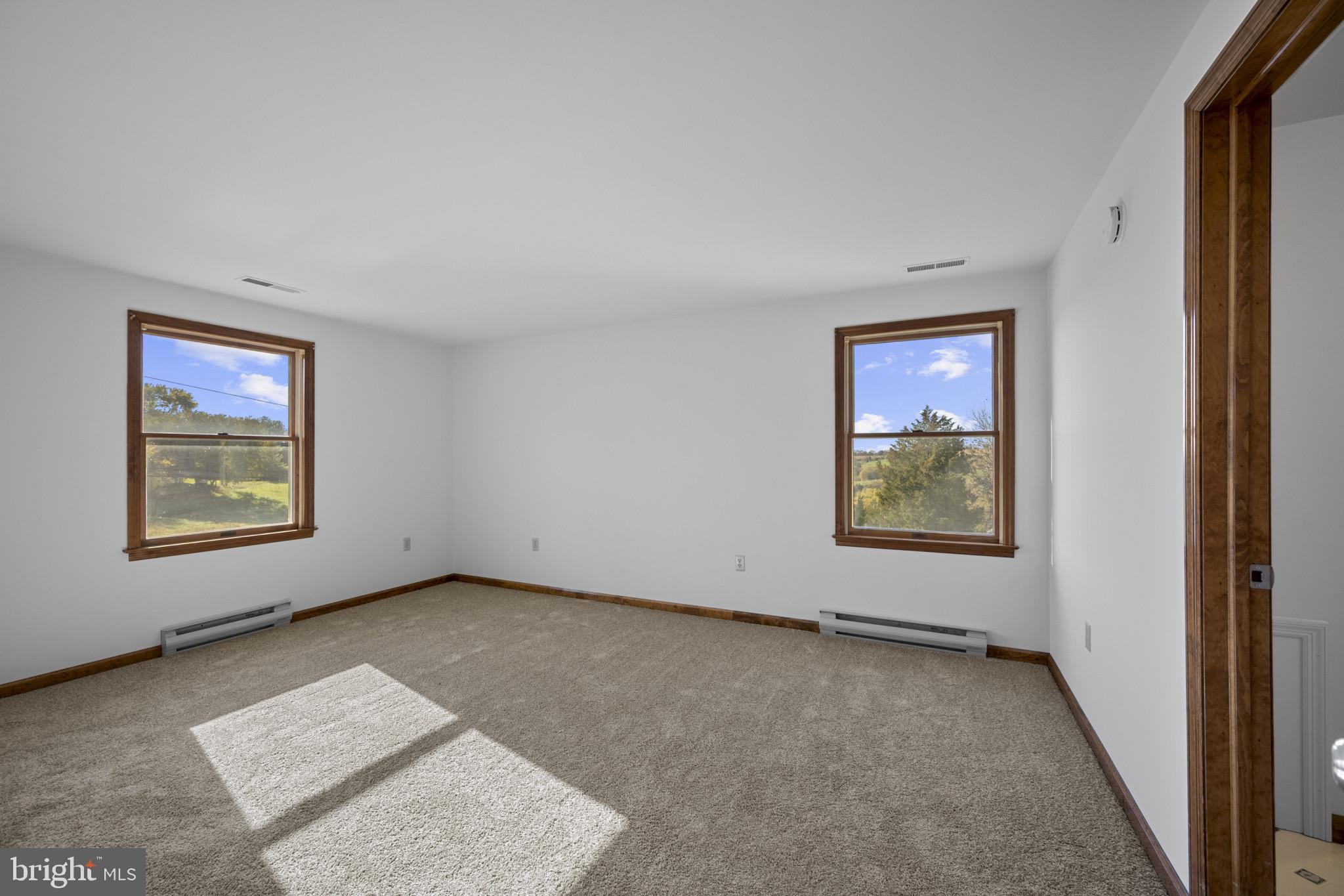 3226 Bidle Road Middletown, MD 21769 - Photo 17 of 49 an empty room with windows