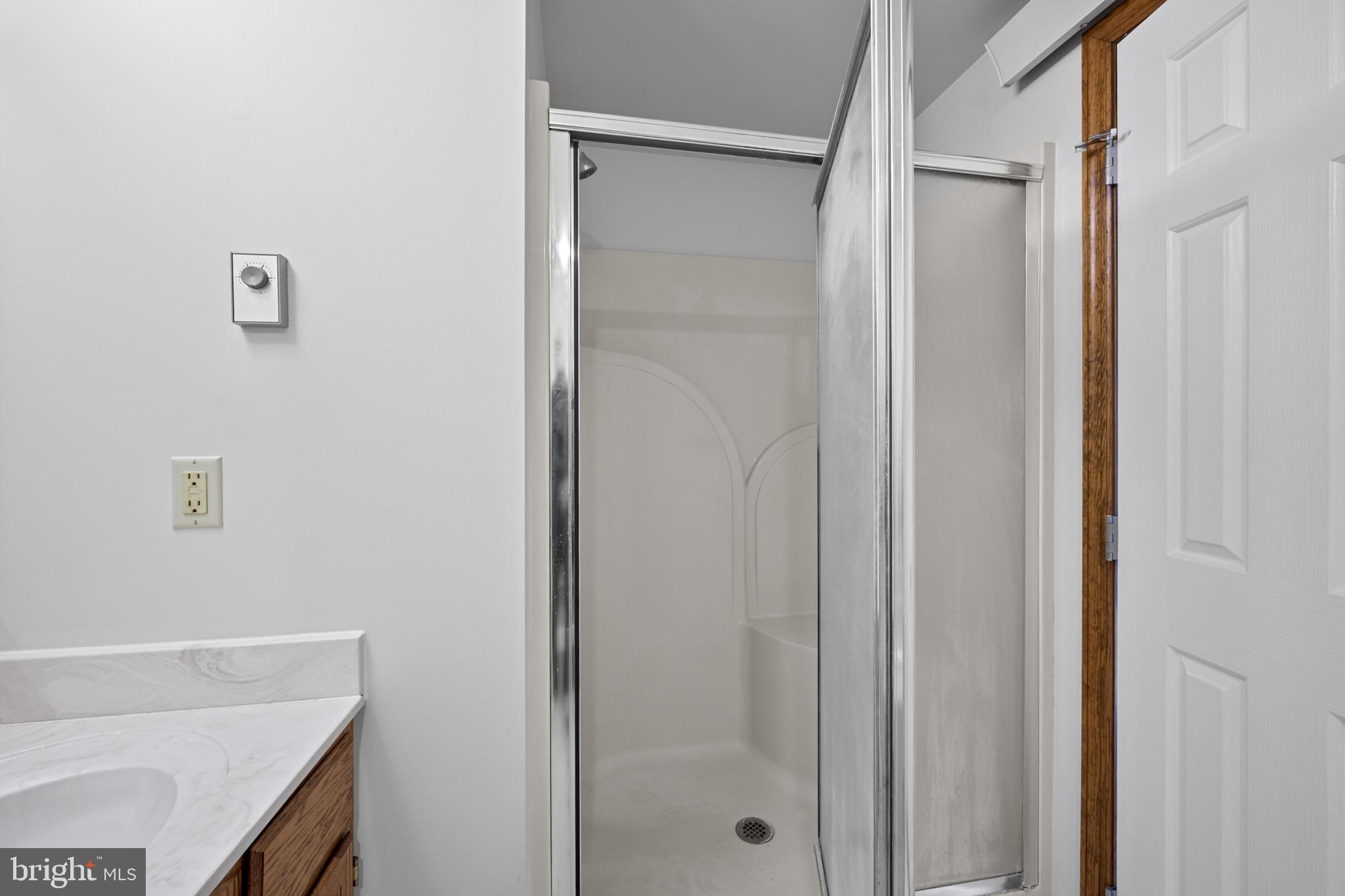 3226 Bidle Road Middletown, MD 21769 - Photo 20 of 49 a bathroom with a bathtub and shower