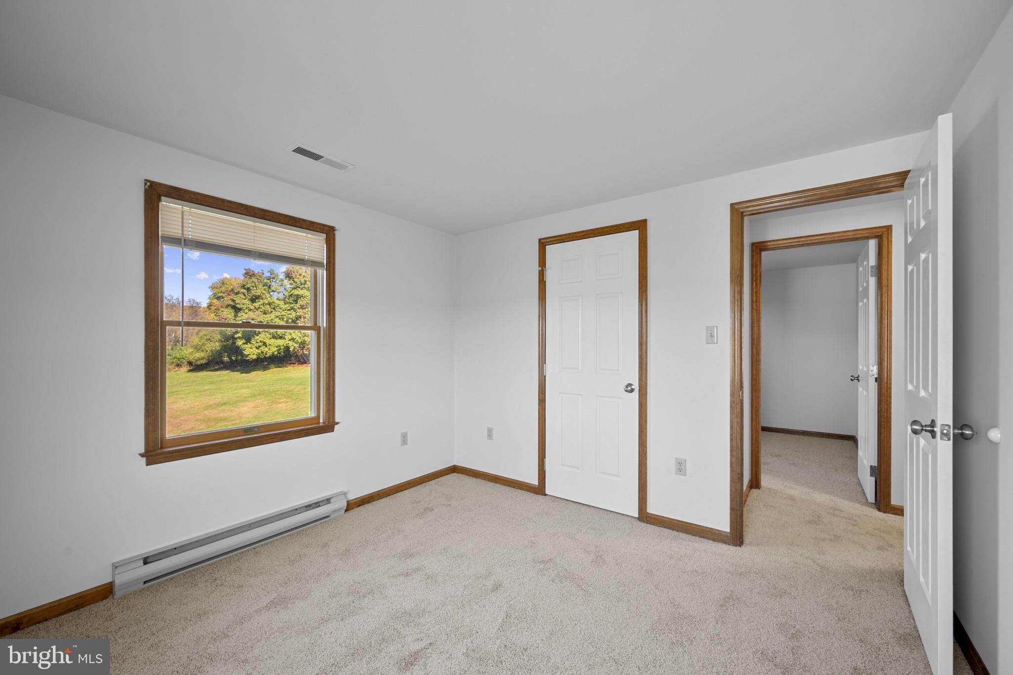 3226 Bidle Road Middletown, MD 21769 - Photo 24 of 49 an empty room with windows and closet