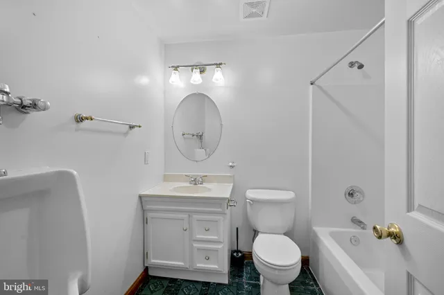 a view of a backyard with swimming pool