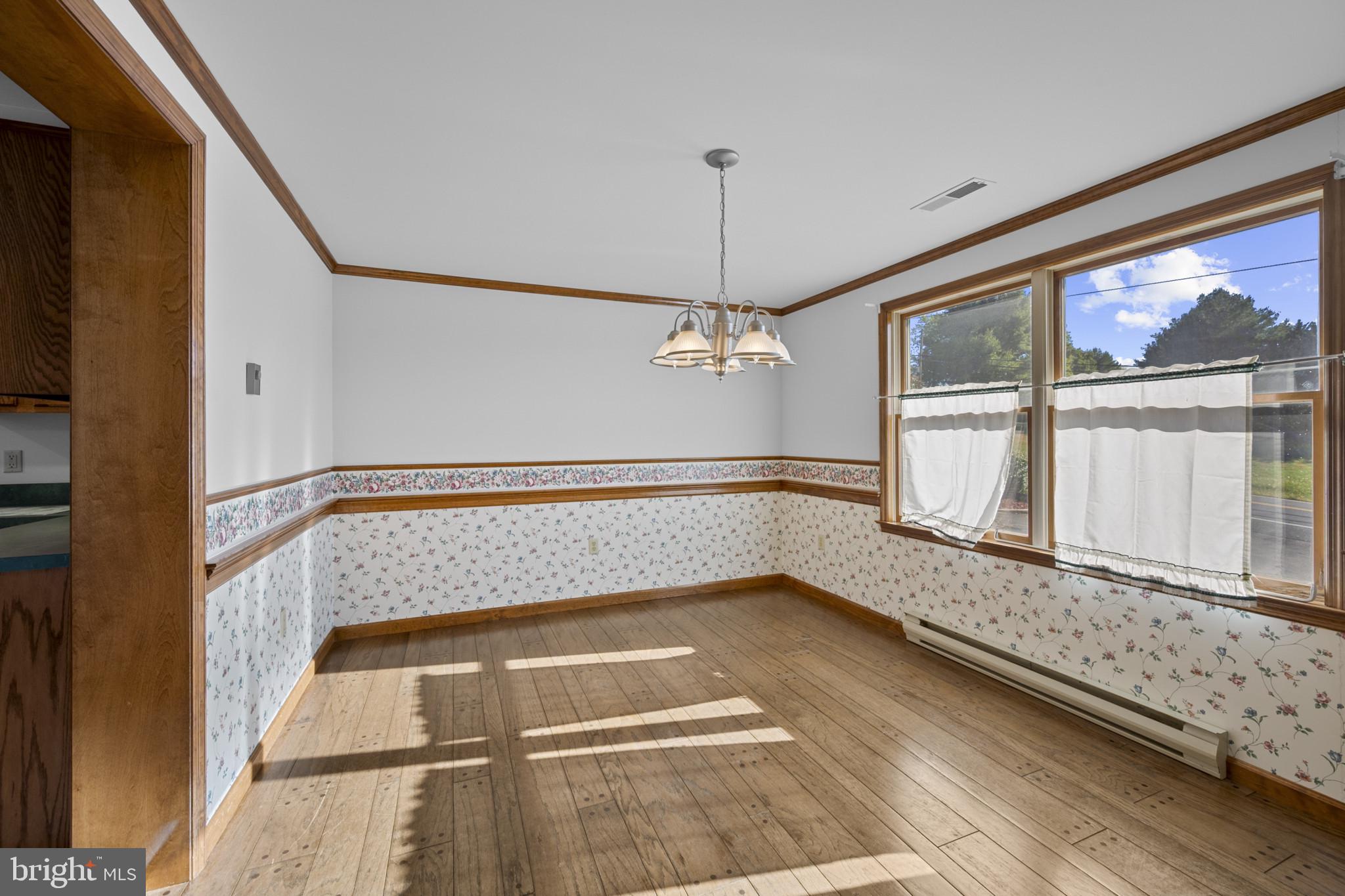 3226 Bidle Road Middletown, MD 21769 - Photo 10 of 49 a view of an empty room with a window