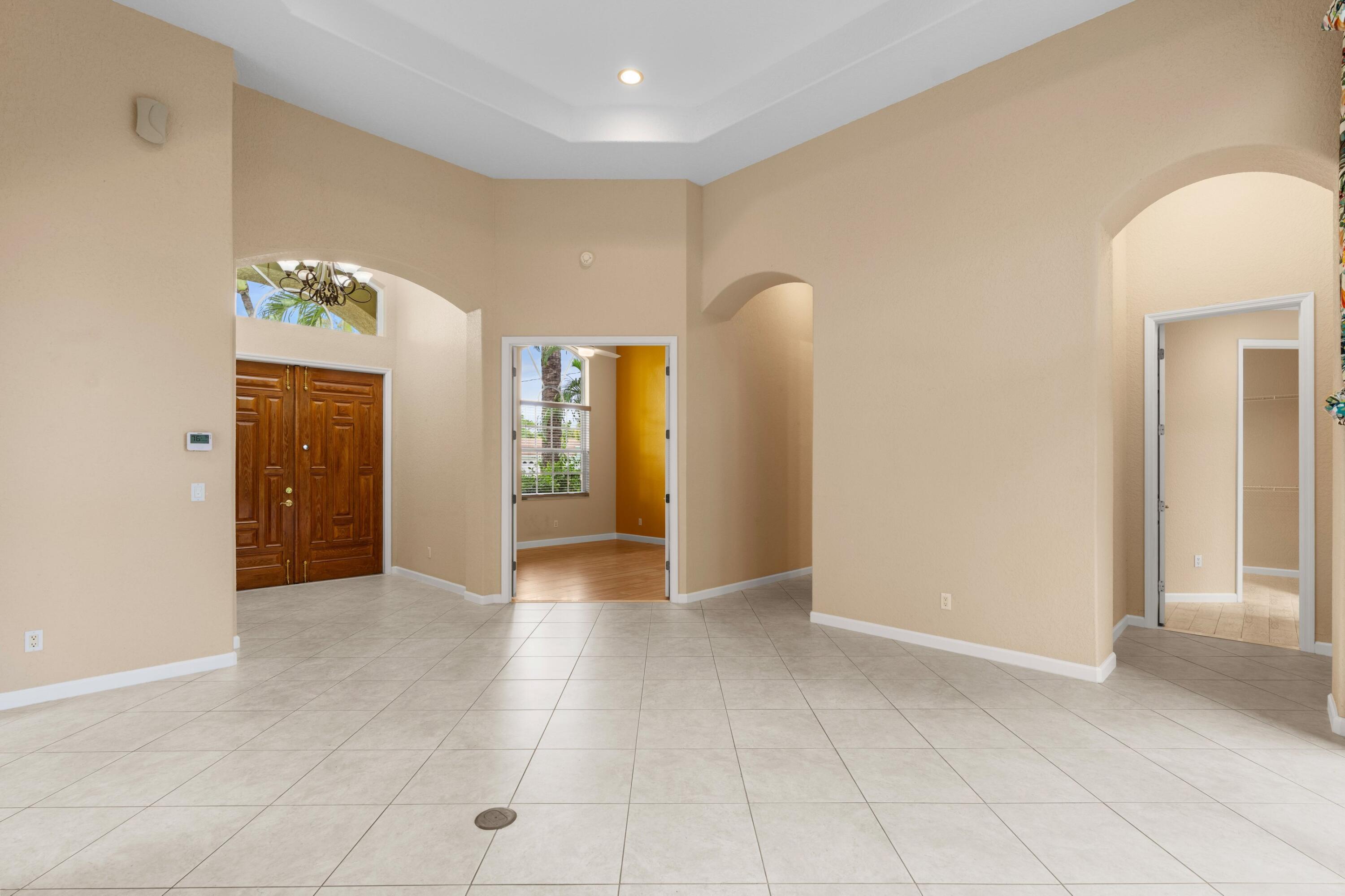 7348 East Country Club Boulevard Boca Raton, FL 33487 - Photo 6 of 50 Foyer