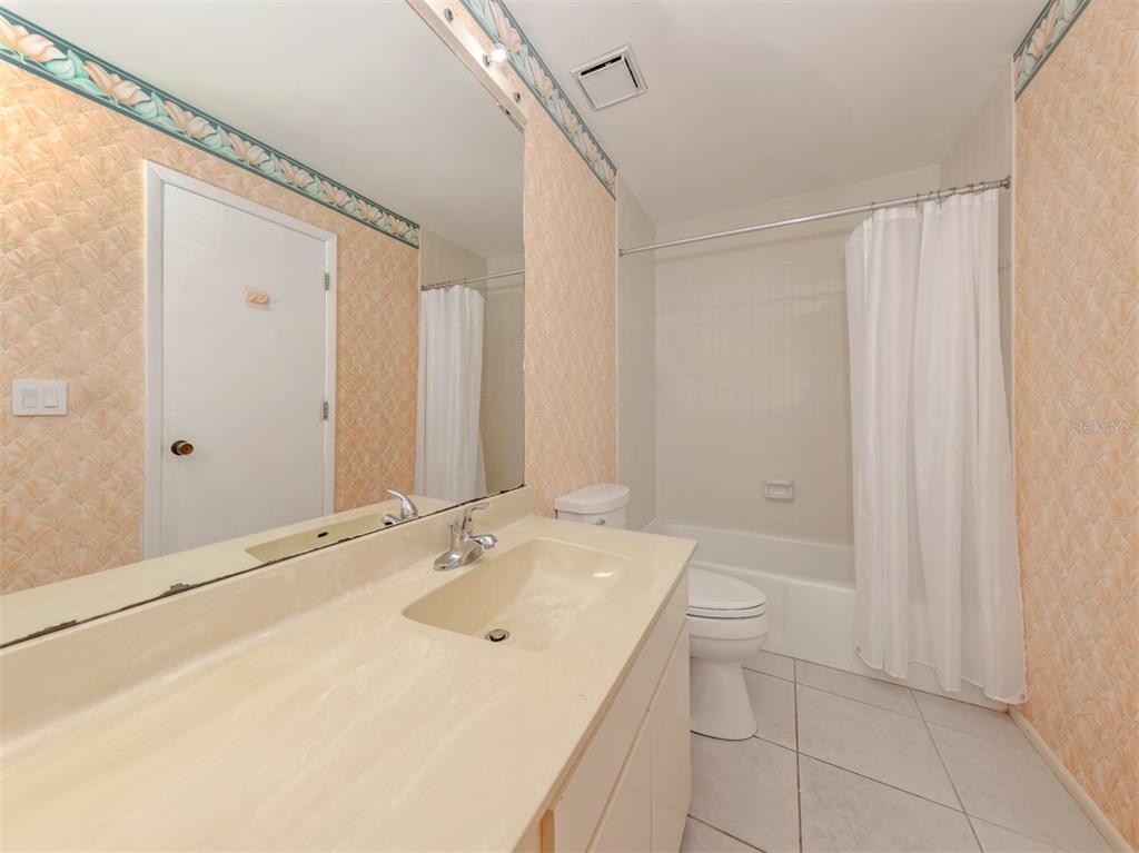 764 Sarabay Road, Unit 8 Osprey, FL 34229 - Photo 34 of 64 a bathroom with a sink a toilet and shower