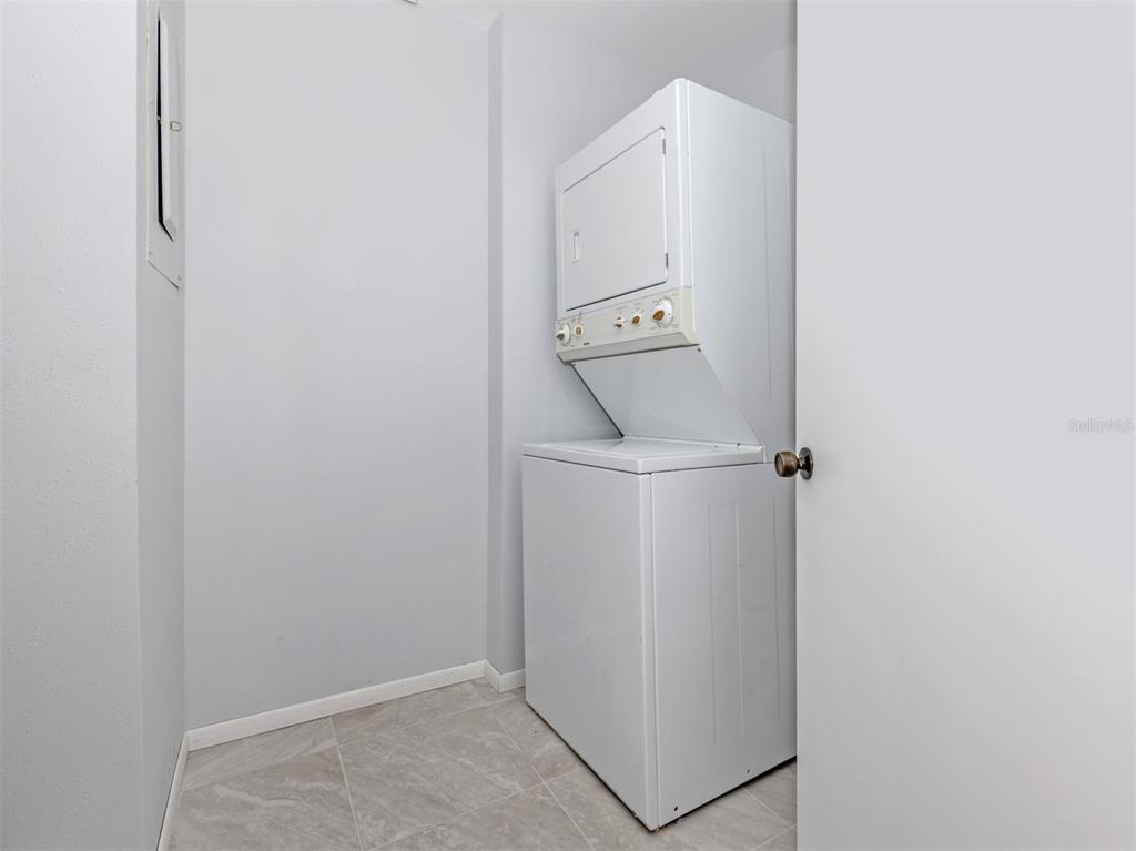 764 Sarabay Road, Unit 8 Osprey, FL 34229 - Photo 36 of 64 a utility room with dryer and washer