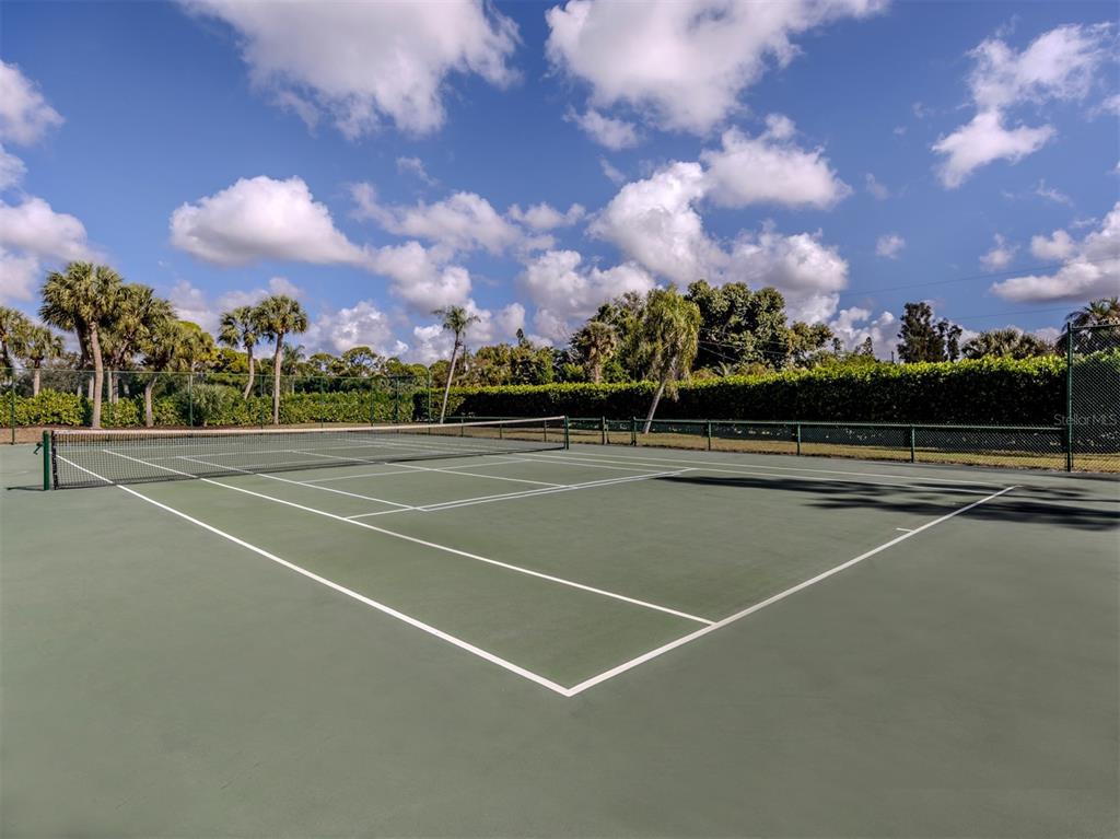 764 Sarabay Road, Unit 8 Osprey, FL 34229 - Photo 49 of 64 a view of a tennis court