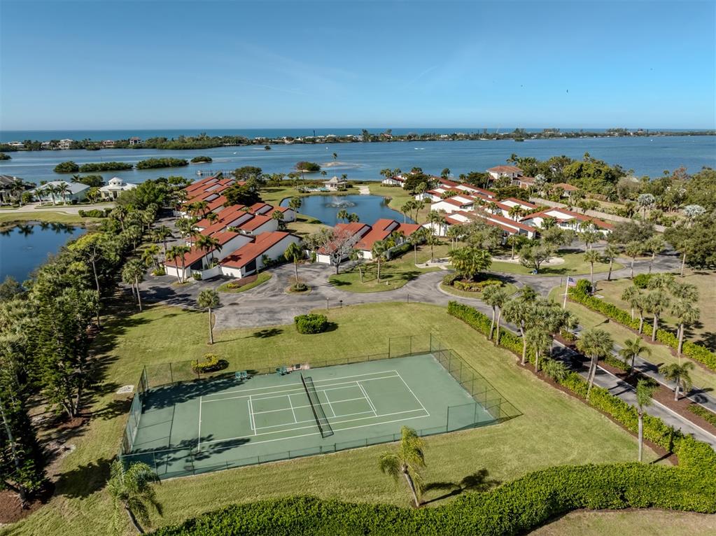764 Sarabay Road, Unit 8 Osprey, FL 34229 - Photo 10 of 64 an aerial view of a residential building with outdoor space