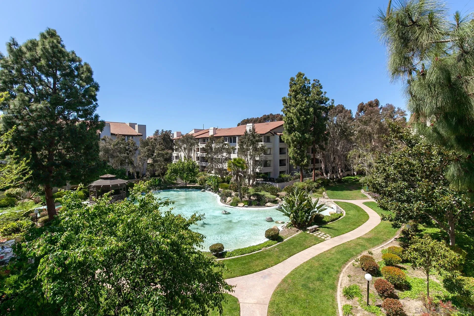 5875 Friars Road, Unit 4307 San Diego, CA 92110 - Photo 2 of 26 a view of a lake with outdoor space