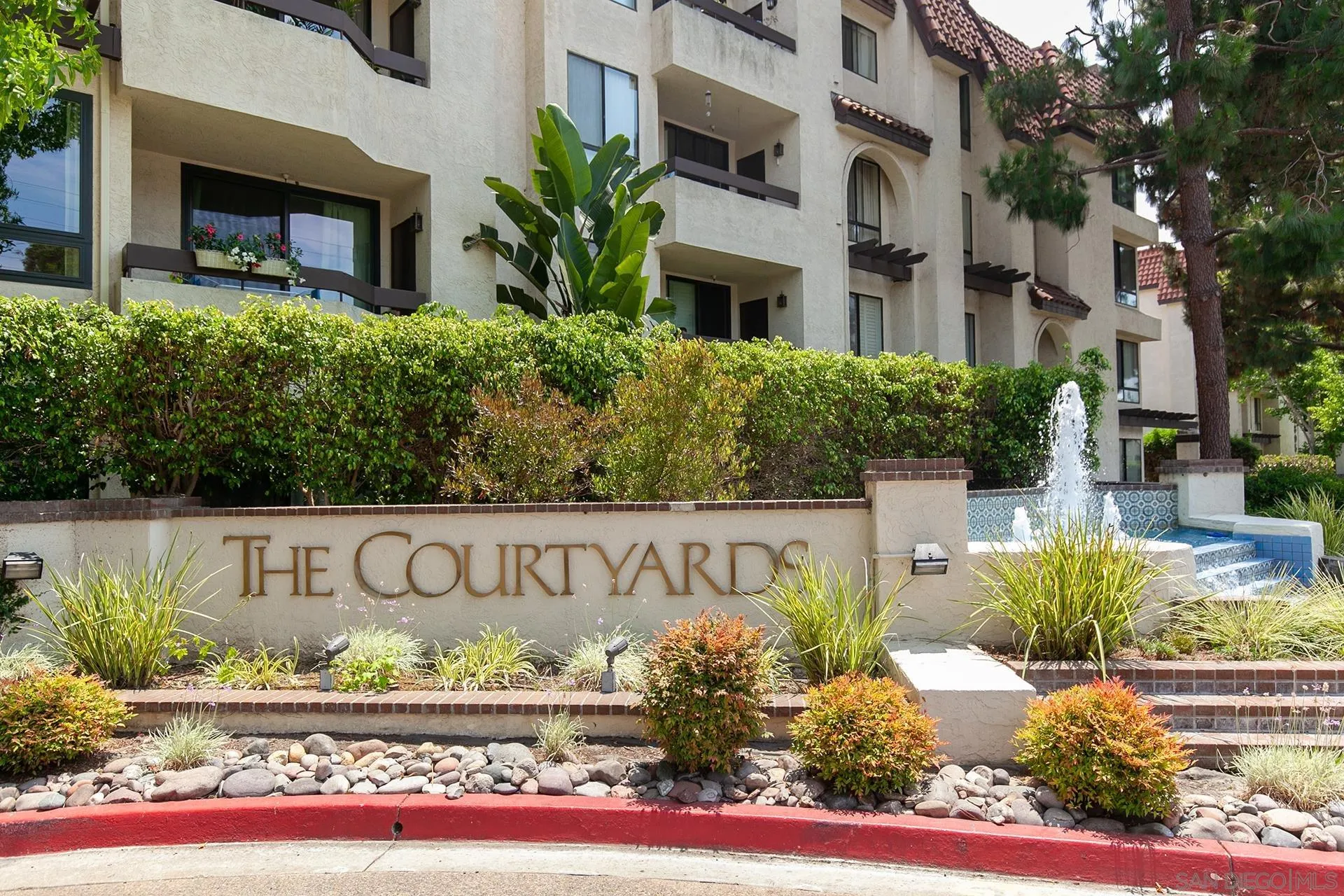 5875 Friars Road, Unit 4307 San Diego, CA 92110 - Photo 23 of 26 a sign broad on the side of the building